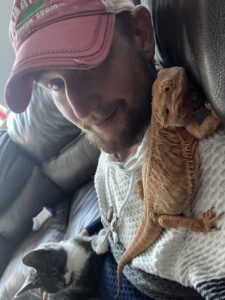 The things that keep Gareth fighting: photos of his sons Jenson and Freddie, his family, and his cat.